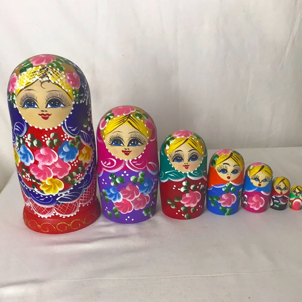 Beautifully decorated nesting dolls set